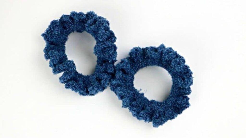  Two crocheted scrunchies.