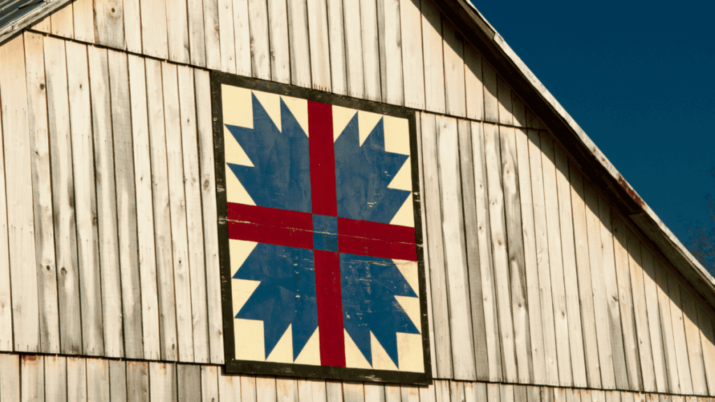This red and turquise quilt shows what are barn quilts