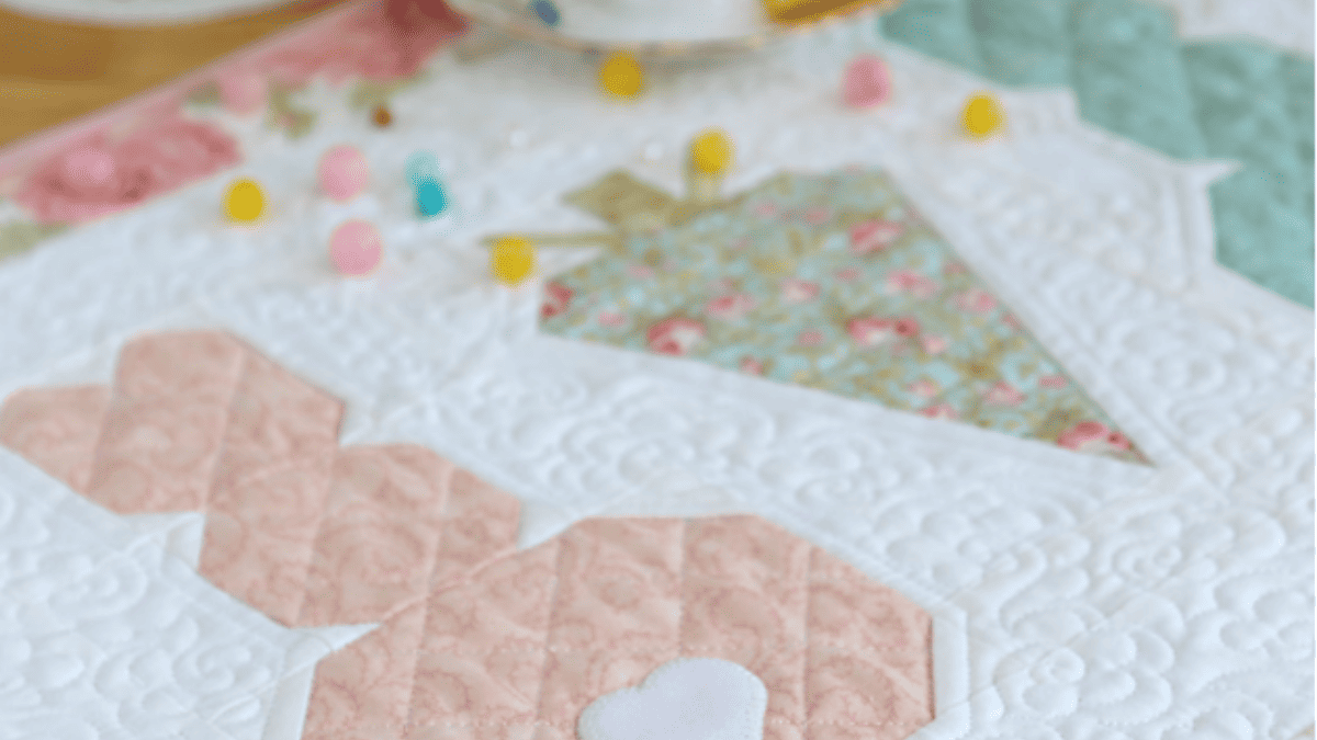 quilted table runner with Easter bunnies and carrots. Part of our Easter table runner patterns collection