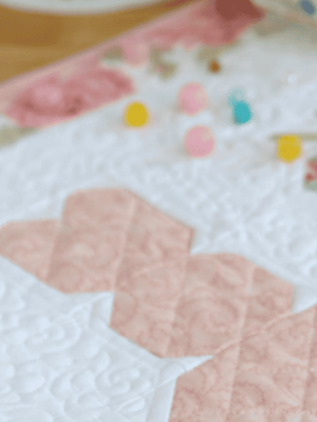 quilted table runner with Easter bunnies and carrots. Part of our Easter table runner patterns collection