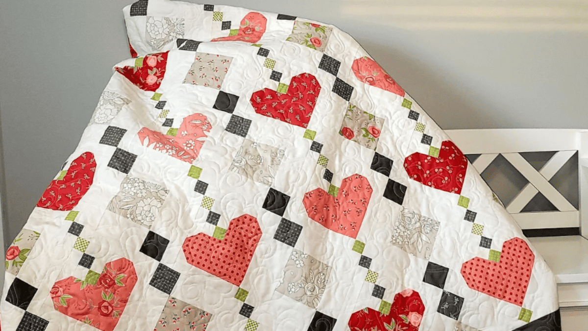 red and pink hearts with dark and cream color squares create fat quarters quilt patterns