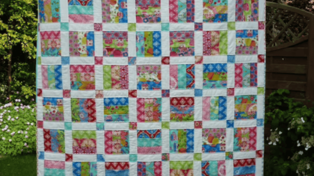 multi colored squares with a white background made from Fat Quarters Quilt Patterns