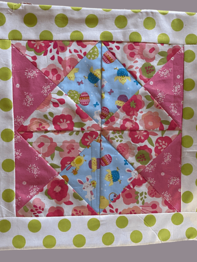 Easter quilt pattern with 4 fabrics including pinks, blues and green polka dot border