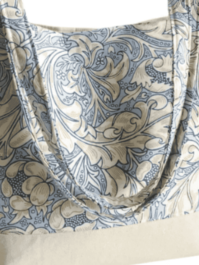 blue flowered top and handles and cream bottom market tote bag