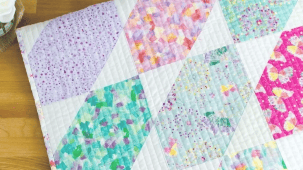 fat quarter quilt with purple, green and pink quilt blocks