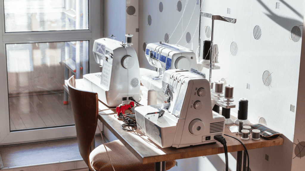serger and sewing machine on same table
