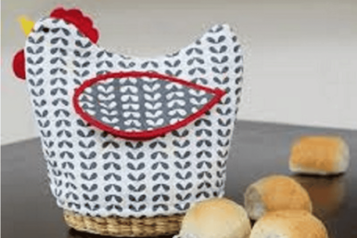 black and white chicken used as bread basket cover