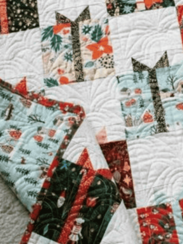 white quilt with different colored christmas gifts