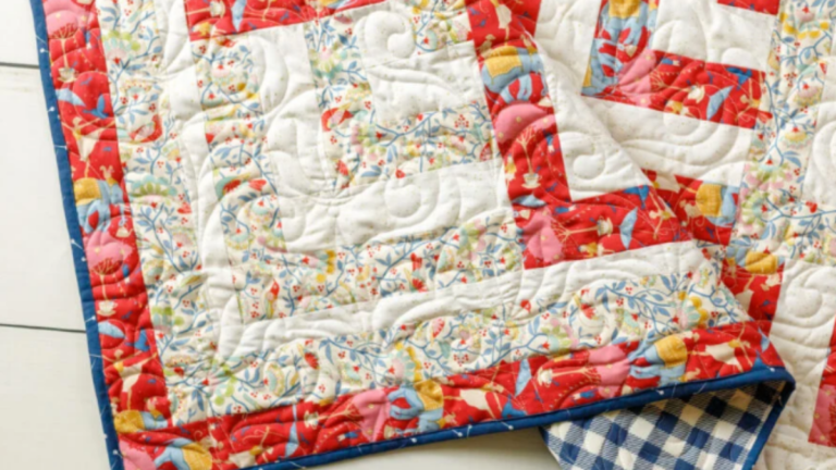 3 fabrics made into a log cabin quilt