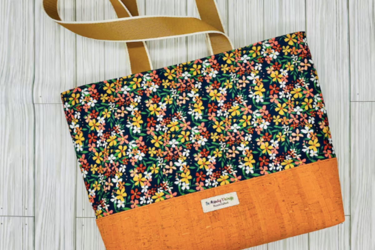 Tote bag with pattern fabric on top and orange fabric on the bottom