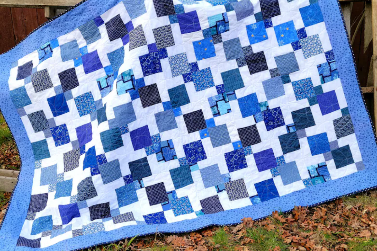 And ine patch quilt patterns in blues and purples