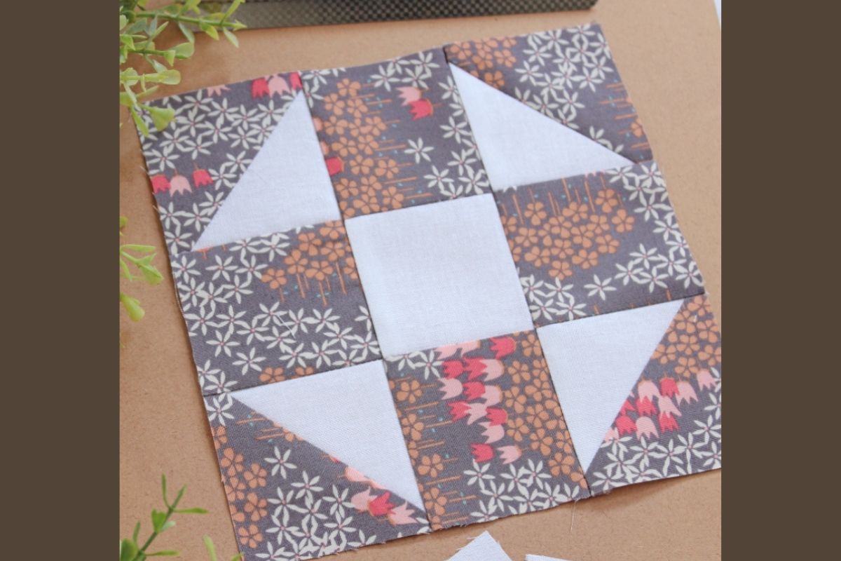 Shoofly quilt pattern in Grays and pinks